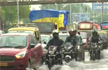Heavy showers in Mumbai: Commuters struggle on water-logged roads, train services hit